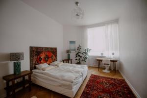 Posteľ alebo postele v izbe v ubytovaní Space Age Residence