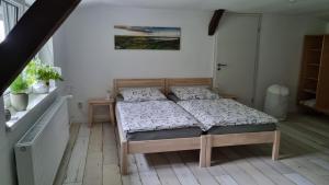Postel nebo postele na pokoji v ubytování Ferienwohnung Schorfheide Krüger + 34 fotografií