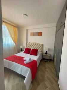 A bed or beds in a room at Moderno apto familiar piso 2