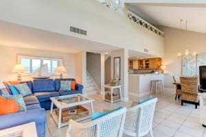 a living room with a couch and a table at 1138 Beach Walker in Amelia Island