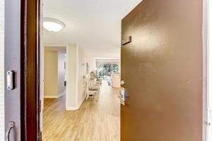 an open door to a hallway with a dining room at 2060 Beach Wood in Amelia Island
