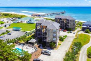 an aerial view of a resort with the ocean at About the Waves in Avon