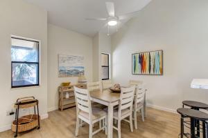 a dining room with a table and chairs at Sea Castles #3 in Amelia Island