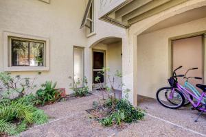 two bikes parked on the side of a house at 3050 Club Villas in Amelia Island