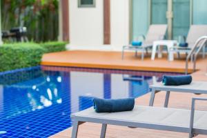 Bazén v ubytování Emerald Pool Villa nebo v jeho okolí