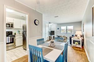 a kitchen and dining room with a table and chairs at 2810 Ohio Avenue #3 in Amelia Island +19 photos