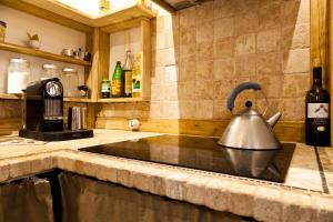 A kitchen or kitchenette at Smart Appart Villa Patrizia