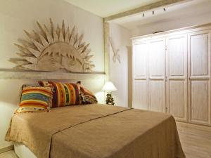 A bed or beds in a room at Smart Appart Villa Patrizia