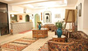 Posezení v ubytování Hôtel LAKASBAH Ait Ben Haddou