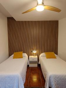 Posteľ alebo postele v izbe v ubytovaní Casa Ana Nerja
