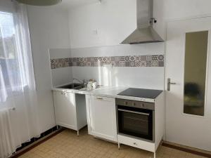 Kuchyň nebo kuchyňský kout v ubytování Maison T3 près de Toulouse