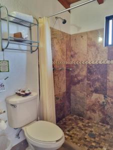 Ein Badezimmer in der Unterkunft Posada El Canto del Cenzontle