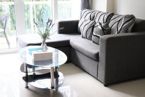 Posezení v ubytování Grand avenue condo Soi Boaukow