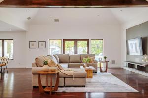 a living room with a couch and a table at Exquisite Oasis near Universal Studios with Large Pool in Los Angeles