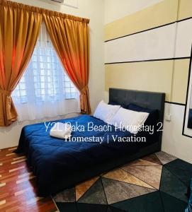 A bed or beds in a room at CozyLuxury Homestay Paka 3-7pax near Paka Beach and surrounding many Restaurant - Y2L Homestay 2
