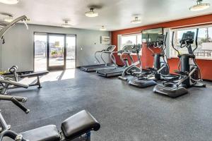 a gym with several treadmills and cardio machines at Skyline Palms 1-Bedroom with Roof-Top Pool in Los Angeles
