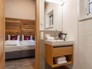 Posteľ alebo postele v izbe v ubytovaní Pinzgau Lodge 2B