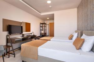 Postel nebo postele na pokoji v ubytování Hotella Resort & Spa - All Inclusive