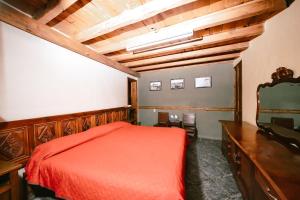 Postel nebo postele na pokoji v ubytování Hotel CasaMia