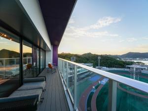a balcony of a building with a view of a race track at SETOUCHI KEIRIN HOTEL 10 by Onko Chishin in Tamano