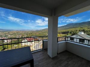 a balcony with a view of the mountains at Seyir Apartmanı in Bolu