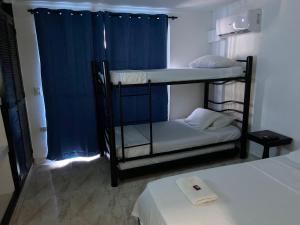 Postel nebo postele na pokoji v ubytování Blue Diamond House