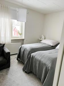 Postel nebo postele na pokoji v ubytování Wonder Rovaniemi