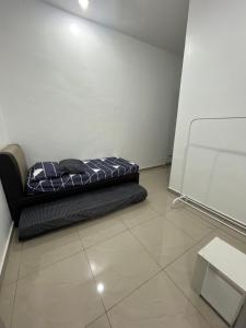 Svetainės erdvė apgyvendinimo įstaigoje Manong Kuala Kangsar Homestay Chegu Wok