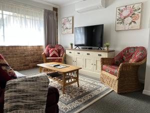 TV a/nebo společenská místnost v ubytování Highgrove