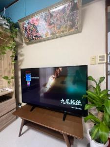 TV a/nebo společenská místnost v ubytování 和風客棧