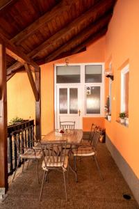 a dining room with a table and chairs at Holiday house with a parking space Daruvar, Bjelovarska - 17937 in Daruvar