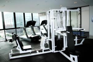 a gym with cardio equipment in a building at Docklands Private Collection - NEWQUAY in Melbourne