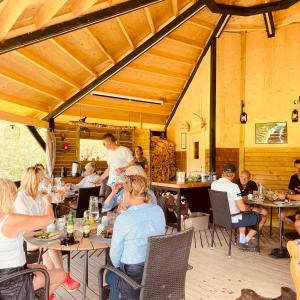 A restaurant or other place to eat at Glamping Höga Kusten