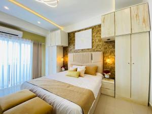 Ліжко або ліжка в номері Ocean Breeze - UDAYA Luxury Apartments