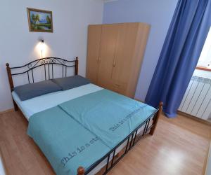 Postel nebo postele na pokoji v ubytování Kobale 1