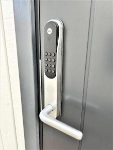 a close up of a door with a remote control at Guest house - Northern tealight in Rovaniemi