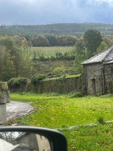 a view of a field from the side of a car at Gurteen farm house in Clonmel