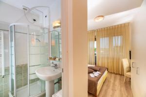 Koupelna v ubytování Hotel Nuova Sabrina