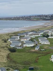 an aerial view of a resort on the beach at Beach life in Lossiemouth