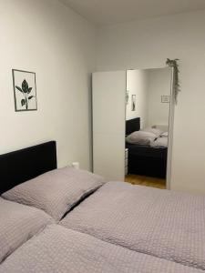 Postel nebo postele na pokoji v ubytování Paky Appartements 00322