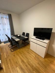 TV a/nebo společenská místnost v ubytování Paky Appartements 00322