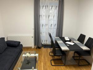 Posezení v ubytování Paky Appartements 00322