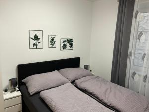 Postel nebo postele na pokoji v ubytování Paky Appartements 00322