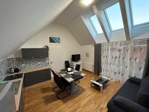 TV a/nebo společenská místnost v ubytování Paky Appartements 00323