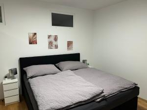 Postel nebo postele na pokoji v ubytování Paky Appartements 00323