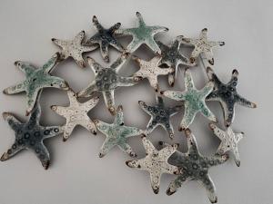 a group of starfish on a wall at Hotel Acquamarina in Portoferraio