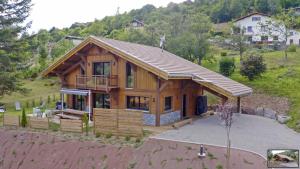 an overhead view of a large wooden house at Le Chalet Margaux La Bresse in La Bresse