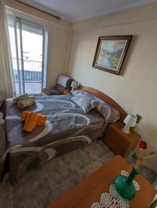 Postel nebo postele na pokoji v ubytování Apartamento en el Corazón de la Ciudad con Balcón Amplio - El Balcó de Tarraco