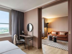 Łóżko lub łóżka w pokoju w obiekcie Pullman Stuttgart Fontana