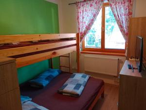 Posteľ alebo postele v izbe v ubytovaní Wellness Penzion Eva